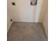 Clean laundry room with tile floor and hookups at 12954 Fennway Ridge Dr, Riverview, FL 33579