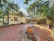 Brick patio with circular design and potted plants at 150 22Nd N Ave, St Petersburg, FL 33704