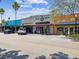 Storefronts along a street in a vibrant commercial district at 1611 Brook Dr, Dunedin, FL 34698