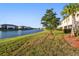 Townhouses with scenic waterfront view and lush green landscape at 20252 Lagente Cir, Venice, FL 34293