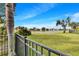 Waterfront view from backyard with a fence at 305 65Th E Ave, Bradenton, FL 34203