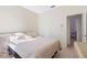 Comfortable bedroom with tile flooring, ample space, and natural light at 3203 Audubon Ct, Tarpon Springs, FL 34688