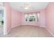 Living room featuring a bay window and tile floors at 3203 Audubon Ct, Tarpon Springs, FL 34688