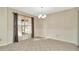 Dining room with tile floors and decorative wallpaper at 3826 Highgate Dr, Valrico, FL 33594