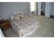 Bedroom features a bed and tile flooring at 6741 Willits Ave, New Port Richey, FL 34655