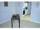 Cozy dining area with decorative wall accents and an open view to the adjacent kitchen at 6741 Willits Ave, New Port Richey, FL 34655