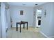Inviting dining space open to the kitchen, perfect for Gathering meals at 6741 Willits Ave, New Port Richey, FL 34655