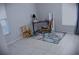 Open living room featuring tiled floors, a desk, and a carpet at 6741 Willits Ave, New Port Richey, FL 34655