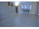 Bright living area with natural light, tile floors, and neutral paint color at 6741 Willits Ave, New Port Richey, FL 34655