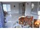 Relaxing sunroom with tile floor, natural light, and a sliding glass door to the outdoors at 6741 Willits Ave, New Port Richey, FL 34655