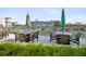 Outdoor patio furniture offers a waterfront view, with a cruise ship in the distance at 912 Channelside Dr # 2601, Tampa, FL 33602