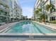 Inviting resort-style pool surrounded by lush landscaping at 912 Channelside Dr # 2601, Tampa, FL 33602