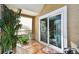 Peaceful balcony featuring sliding glass doors and plants at 9481 Highland Oak Dr # 807, Tampa, FL 33647