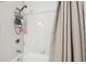 Bathroom with shower/tub combo and updated fixtures at 9481 Highland Oak Dr # 807, Tampa, FL 33647