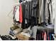 Well-organized closet with ample hanging and shelving space at 9481 Highland Oak Dr # 807, Tampa, FL 33647