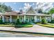 The Highlands community center with landscaping and a walkway at 9481 Highland Oak Dr # 807, Tampa, FL 33647
