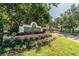 Landscaped entrance to The Highlands condominium community at 9481 Highland Oak Dr # 807, Tampa, FL 33647
