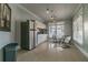 Community kitchen with stainless steel appliances and a small dining area at 9481 Highland Oak Dr # 807, Tampa, FL 33647