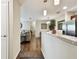 Bright entryway offers a glimpse of the living and kitchen areas at 9481 Highland Oak Dr # 807, Tampa, FL 33647