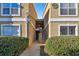 Condo building exterior with stairs and landscaping at 9481 Highland Oak Dr # 807, Tampa, FL 33647
