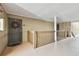 Interior hallway with access to unit and fire extinguisher at 9481 Highland Oak Dr # 807, Tampa, FL 33647