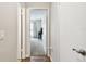 Hallway with wood floors leading to bedroom at 9481 Highland Oak Dr # 807, Tampa, FL 33647