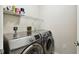 Laundry room with Samsung washer and dryer at 9481 Highland Oak Dr # 807, Tampa, FL 33647