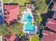 An overhead view of a community pool with patio furniture at 9481 Highland Oak Dr # 807, Tampa, FL 33647