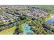 Aerial view of tennis courts in community at 9481 Highland Oak Dr # 807, Tampa, FL 33647