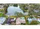 Aerial view showcasing the house's location near a lake at 1307 Windjammer Pl, Valrico, FL 33594