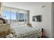 Spacious bedroom with king-size bed and city view at 175 1St S St # 704, St Petersburg, FL 33701