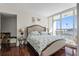 Bright bedroom with king-size bed and water view at 175 1St S St # 704, St Petersburg, FL 33701
