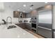 Modern kitchen with stainless steel appliances and ample counter space at 175 1St S St # 704, St Petersburg, FL 33701