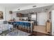 Modern kitchen with stainless steel appliances and breakfast bar at 175 1St S St # 704, St Petersburg, FL 33701