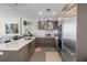Modern kitchen with stainless steel appliances and sleek cabinetry at 175 1St S St # 704, St Petersburg, FL 33701