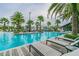 Inviting pool with lounge chairs for relaxing at 2409 Hearth Dr, Odessa, FL 33556