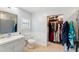 Bathroom with walk-in closet and shower/tub combo at 2609 65Th E St, Bradenton, FL 34208