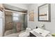 Clean bathroom, featuring a walk-in shower and modern vanity at 2609 65Th E St, Bradenton, FL 34208