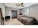 Bright bedroom with tiled floors and a ceiling fan at 2609 65Th E St, Bradenton, FL 34208