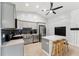 Modern kitchen with stainless steel appliances and island at 2609 65Th E St, Bradenton, FL 34208