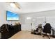 Living room with large TV and ample space at 2609 65Th E St, Bradenton, FL 34208