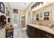 Bathroom with granite vanity, walk-in shower, and pool view at 2914 Shipston Ave, New Port Richey, FL 34655