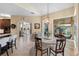 Charming breakfast nook with round table and access to the pool at 2914 Shipston Ave, New Port Richey, FL 34655