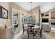 Bright breakfast nook with a view of the pool and lanai at 2914 Shipston Ave, New Port Richey, FL 34655