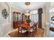 Formal dining room with a chandelier and large windows at 2914 Shipston Ave, New Port Richey, FL 34655