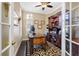 Bright home office features built-in cabinetry and hardwood floors at 2914 Shipston Ave, New Port Richey, FL 34655