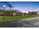 Beautiful house exterior at dusk with a manicured lawn at 2914 Shipston Ave, New Port Richey, FL 34655