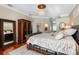 Luxurious main bedroom with a king-size bed and ample closet space at 2914 Shipston Ave, New Port Richey, FL 34655