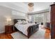 Spacious main bedroom with a king-size bed and access to the pool area at 2914 Shipston Ave, New Port Richey, FL 34655