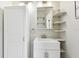 Clean bathroom with white vanity and shelving at 301 Old Hopewell Rd, Plant City, FL 33567